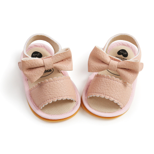 Sandalo rosa per bambini con fiocco