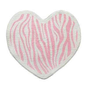 Un tappeto a forma di cuore bianco e rosa per la camera da letto di una bambina, con un motivo zebrato.