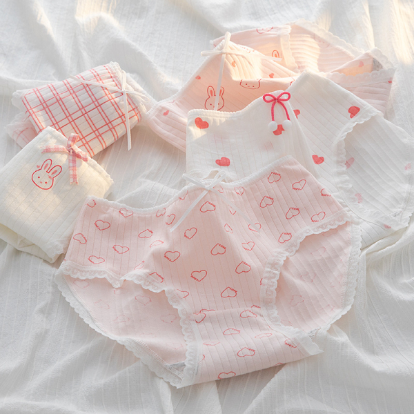 Mutandine da bambina in bianco e rosa con fiocchi, cuori, coniglietti e strisce, in cotone a coste
